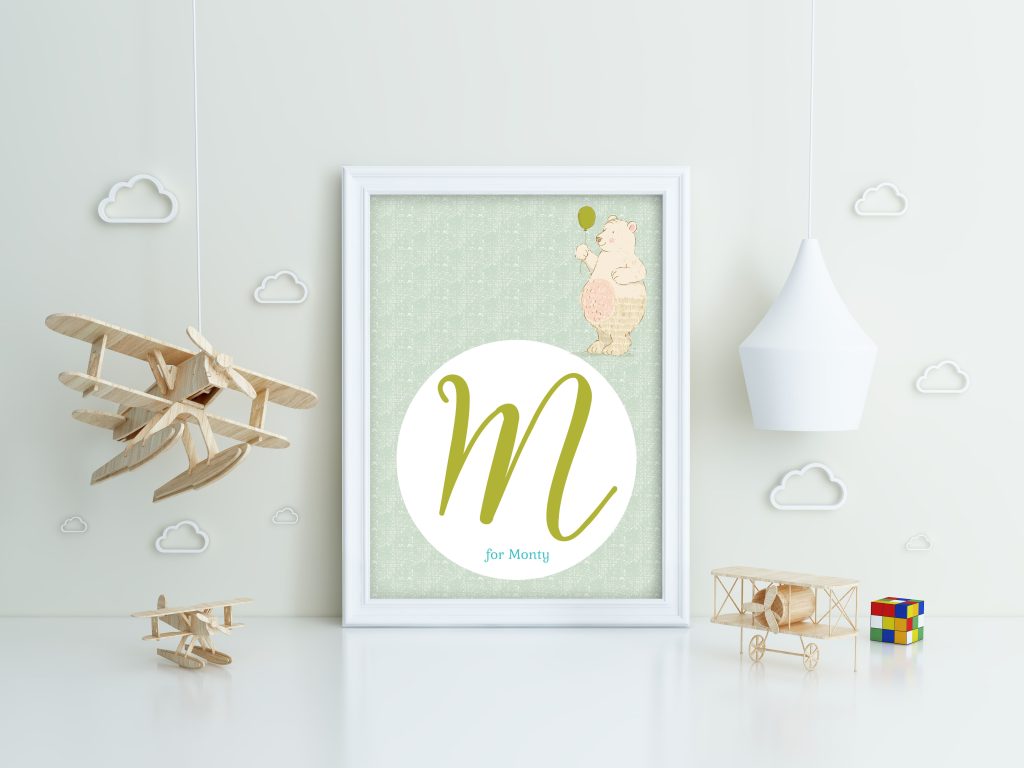 Nursery print design featuring a child’s initial with cute decorative elements.