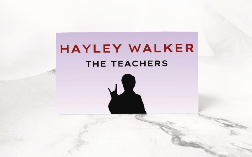 Themed wedding guest name card design with elegant styling.